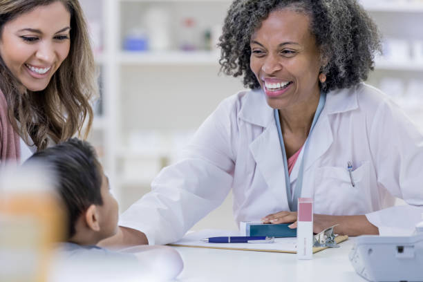 istock Caring mature African American female pharmacist 1163992514