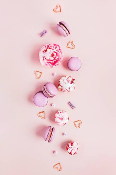 Greeting card with peonies and macaroons.