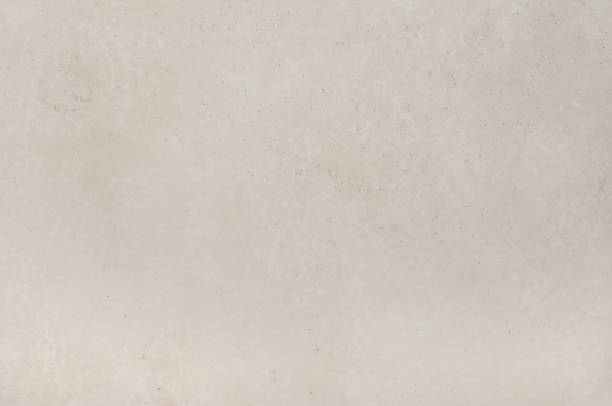 istock The surface texture of natural stone travertine. 1163997793