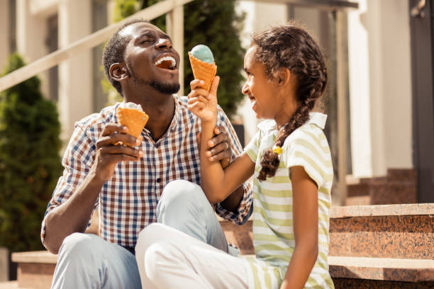 istock Happy young father playing with his daughter 1163999240