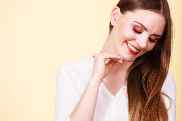 istock Smiling attractive woman with full makeup 1164002327