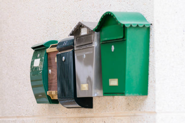 istock Row of letterboxes on a wall 1164003793