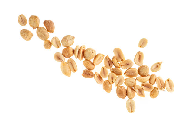 istock Roasted salted peanuts isolated on a white background, top view. 1164004775