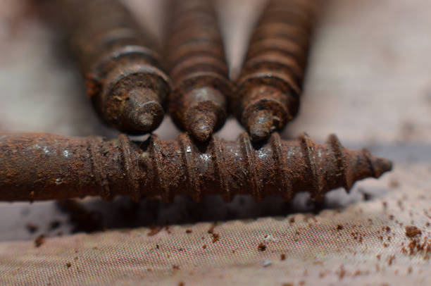 screw-made nails made of iron shaped tapered with screw and brown because of the iron that has been corroded\