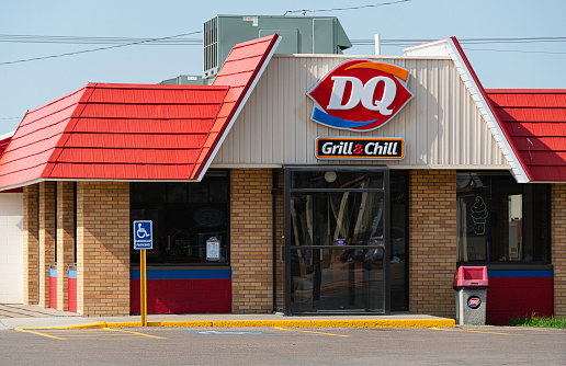 The Dairy Queen in Glasgow, Montana. Founded in 1940, Dairy Queen is a chain that serves primarily ice cream and related products with over 5,700 locations. It is part of Warren Buffett’s Berkshire Hathaway.