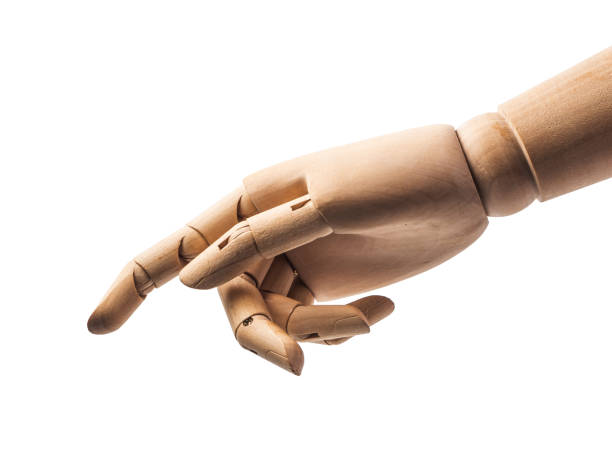 hand of wood doll make fingers to touch on white bakground . stock photo