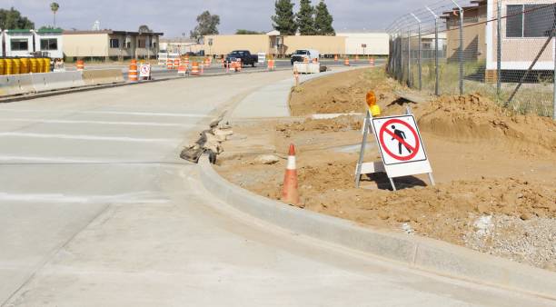istock Sidewalk Closed Sign for New Roadway Construction in Perris California 1164009754
