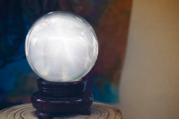 Crystal ball used to see the future, clairvoyance, divination and psychic readings stock photo