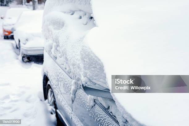 Snow Covered Car Windscreen With The Smiles Written In The Snow Stock Photo  - Download Image Now - iStock