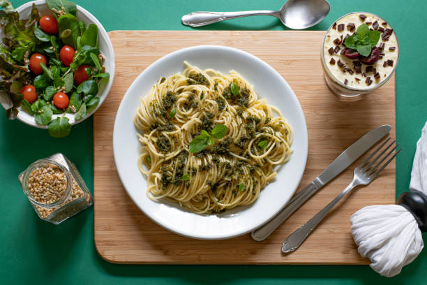 istock Spaghetti with homemade pesto sauce 1164013951