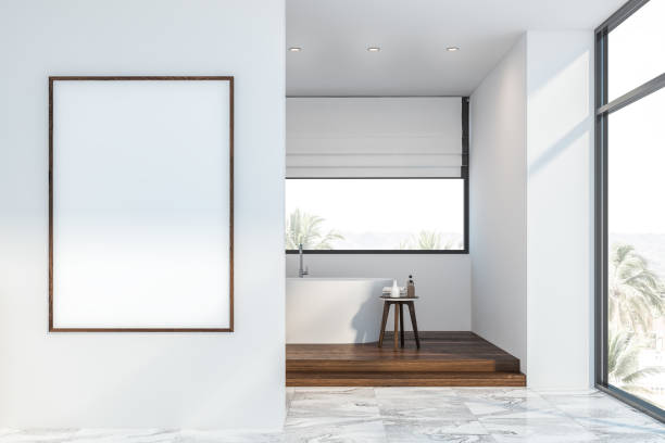 istock White loft bathroom with tub and poster 1164015894