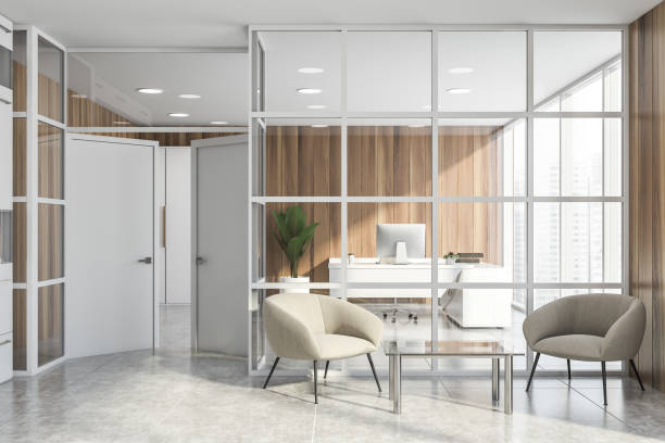 istock Glass office waiting room with armchairs 1164016103