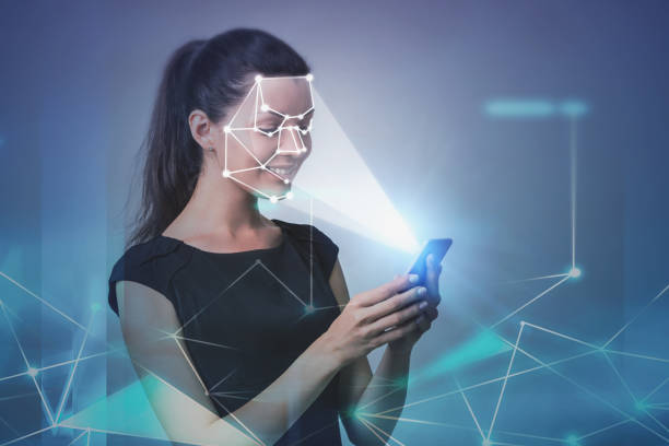 istock Woman with phone, face recognition technology 1164016296