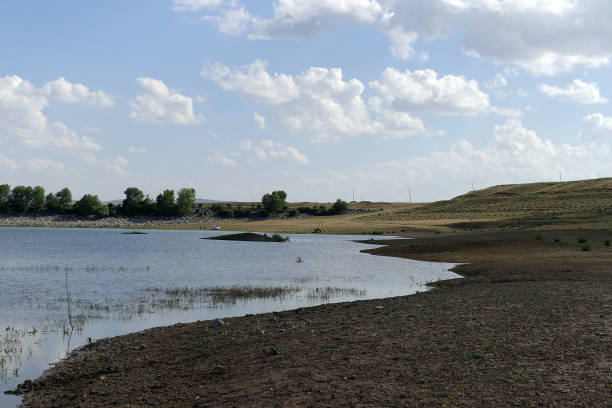 istock global warming and drought reduced lake waters, 1164017593