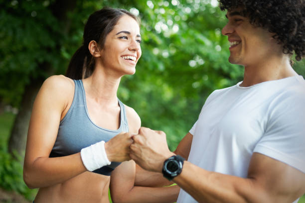 istock Happy young people jogging and exercising in nature 1164019129
