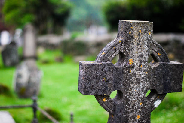 istock Celtic cross in a cementery at Glendalough (Ireland) 1164021637