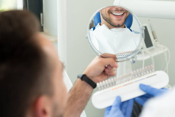 istock Handsome young man in stomatology clinic 1164023743