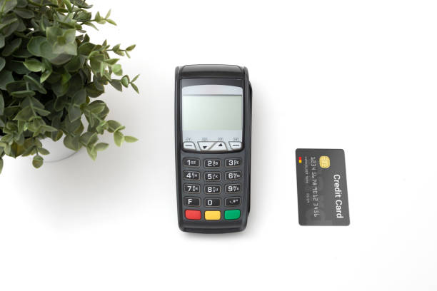 istock Payment terminal with credit card top view 1164023747