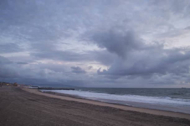 istock Stormy skies make for interesting sunset in Playa del Rey, CA 1164025392