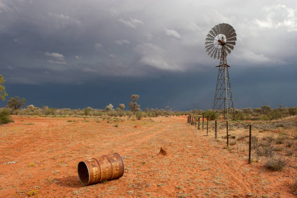 Storm and Windmill in outback Queensland Australia