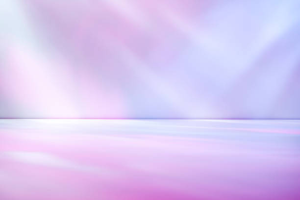 istock Beams of muted purple and blue light 1164030529