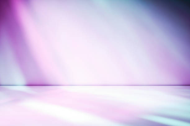 istock Beams of muted purple and blue light 1164030548