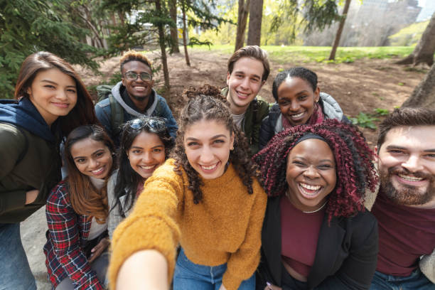istock Multi-Ethnic Group of University Students Taking a Selfie 1164032694