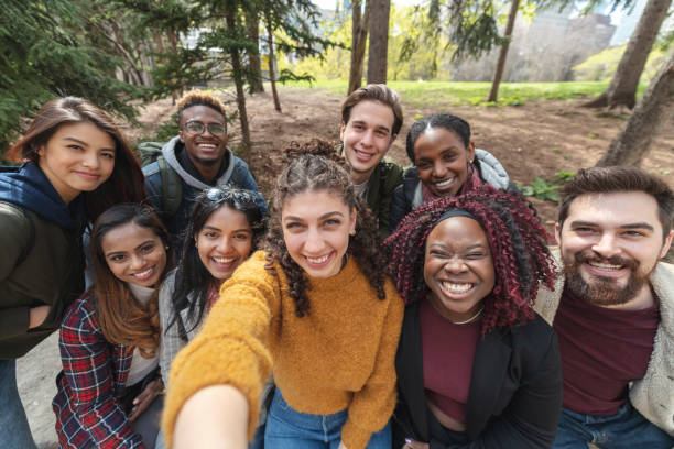 istock Multi-Ethnic Group of University Students Taking a Selfie 1164032695