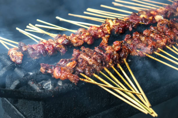 istock Indonesian chicken satay on bbq grill 1164033417