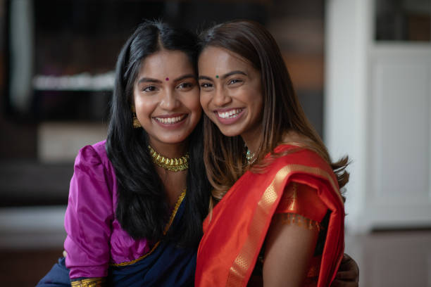 istock Two (2) Happy and Attractive Indian Sisters 1164033434