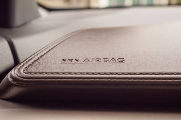 istock airbag safety sign on brown leather texture in modern car 1164033529