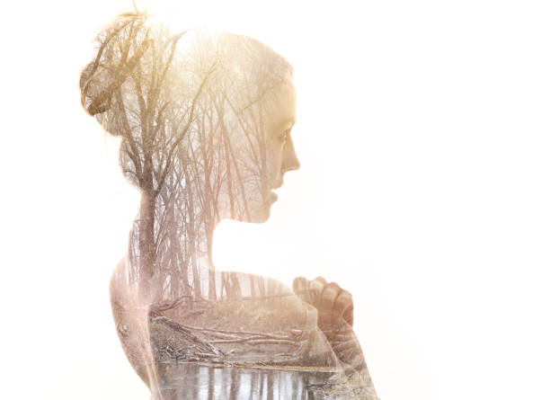 istock Multiple Exposure of young woman and nature 1164037921