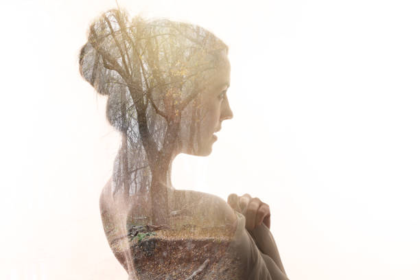 istock Multiple Exposure of young woman and nature 1164037943