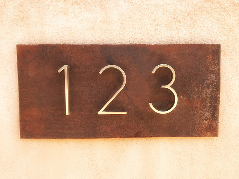 Number 123 Street Address Plaque. Copy space available.