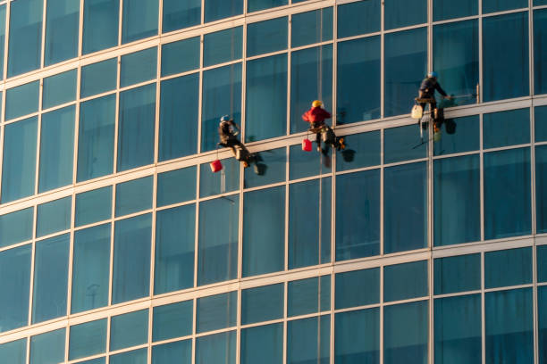 istock The window washers on the skyscrapers at work, 1164047500