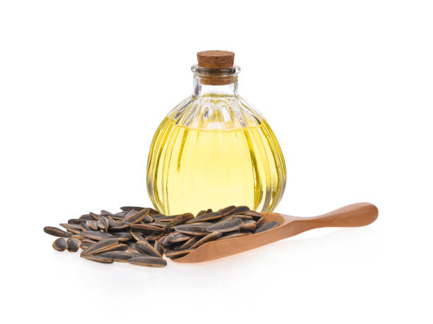 istock sunflower oil on white background 1164048420