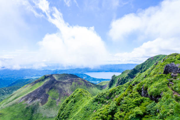 istock Mountain landscape against cloudy blue sky in Japan 1164050744