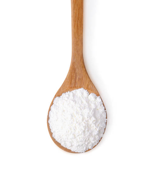 cornflour  on wooden spoon cornflour  on wooden spoon starch grain stock pictures, royalty-free photos & images