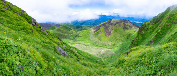 istock Mountain landscape against cloudy blue sky in Japan 1164051572