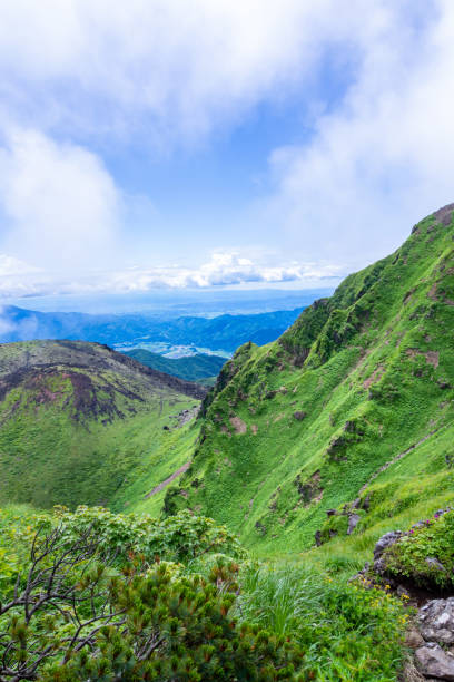istock Mountain landscape against cloudy blue sky in Japan 1164051590