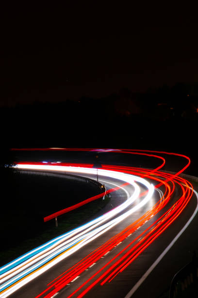 istock lights of cars with night 1164051956