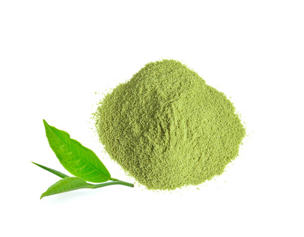 istock green tea leaves and powder on white background 1164052622