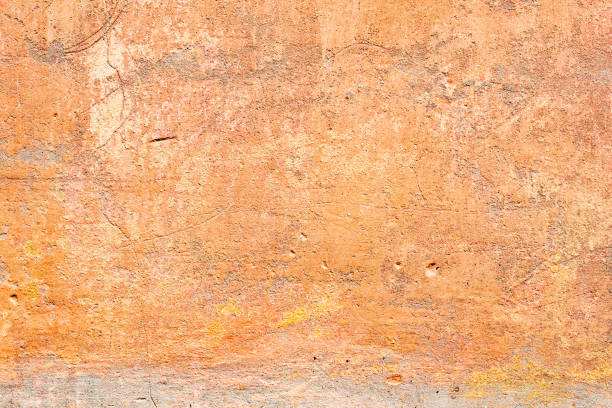 istock Texture of a concrete wall with cracks and scratches which can be used as a background 1164054722