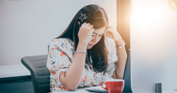 istock Asian businesswoman serious about the work and using notebook for business partners discussing documents and ideas at meeting 1164054784