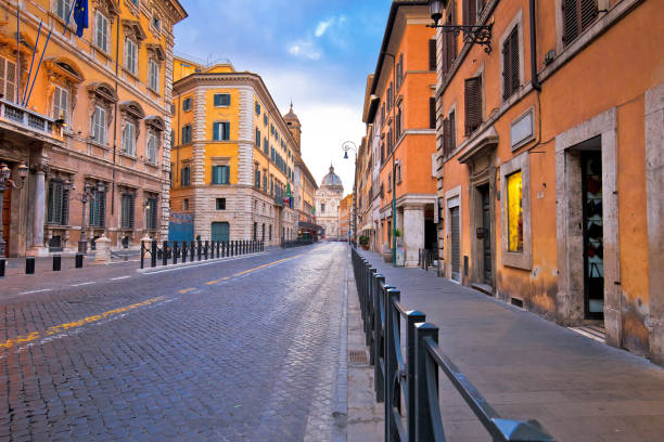 istock Colorful empty street of Rome dawn view 1164055923