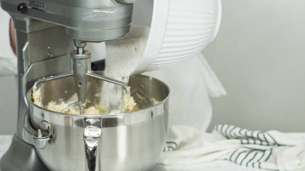 istock Mixing ingredients in standing kitchen mixer to bake sugar cookies. 1164055933