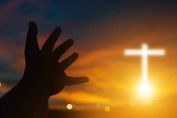 istock Human hands open palm up worship. Eucharist Therapy Bless God Helping Repent Catholic Easter Lent Mind Pray. Christian Religion concept background.Fighting and victory for god.people prayer at sunset 1164057008