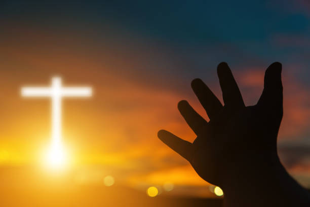 istock Human hands open palm up worship. Eucharist Therapy Bless God Helping Repent Catholic Easter Lent Mind Pray. Christian Religion concept background.Fighting and victory for god.people prayer at sunset 1164057806