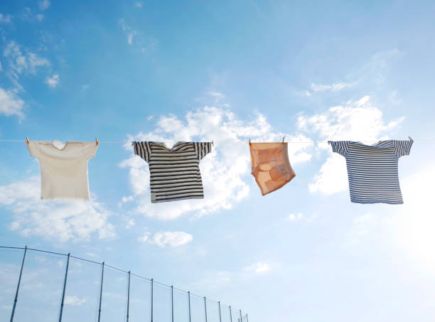 istock Drying cloths under the sun and Blue sky with cloud 1164059124