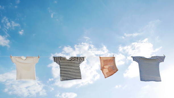 istock Hang Clothes Laundry in Clear Sky, Wind Blow and Bright Sun 1164059125